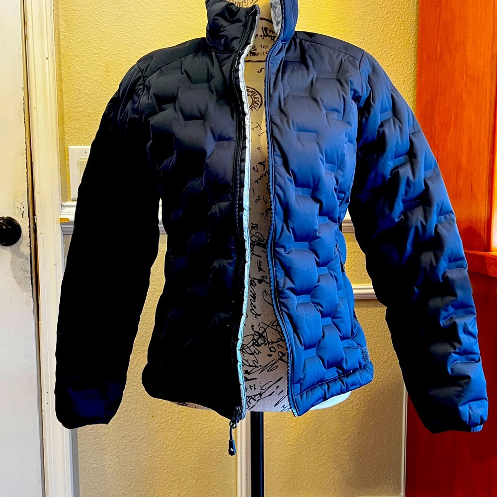 Almost brand new use twice beautiful blue jacket
